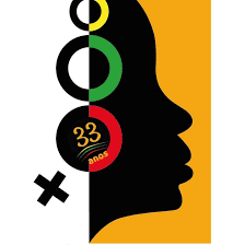 Logo do N'zinga - Coletivo de Mulheres Negras. A logo apresenta a silhueta do rosto de uma mulher negra e, sobre a orelha, como se fosse um brinco, o símbolo do feminismo.